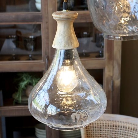 Sklenená lampa s drevom