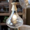 Sklenená lampa s drevom